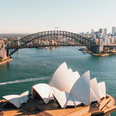 Sydney Opera House cover photo, representing the Energy Climate Summit in Australia, centered on renewable and solar energy.