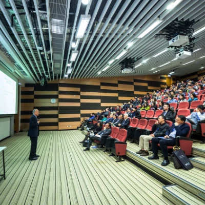 Cover photo of a speaker at the All Energy Australia conference, focused on renewable and solar energy.